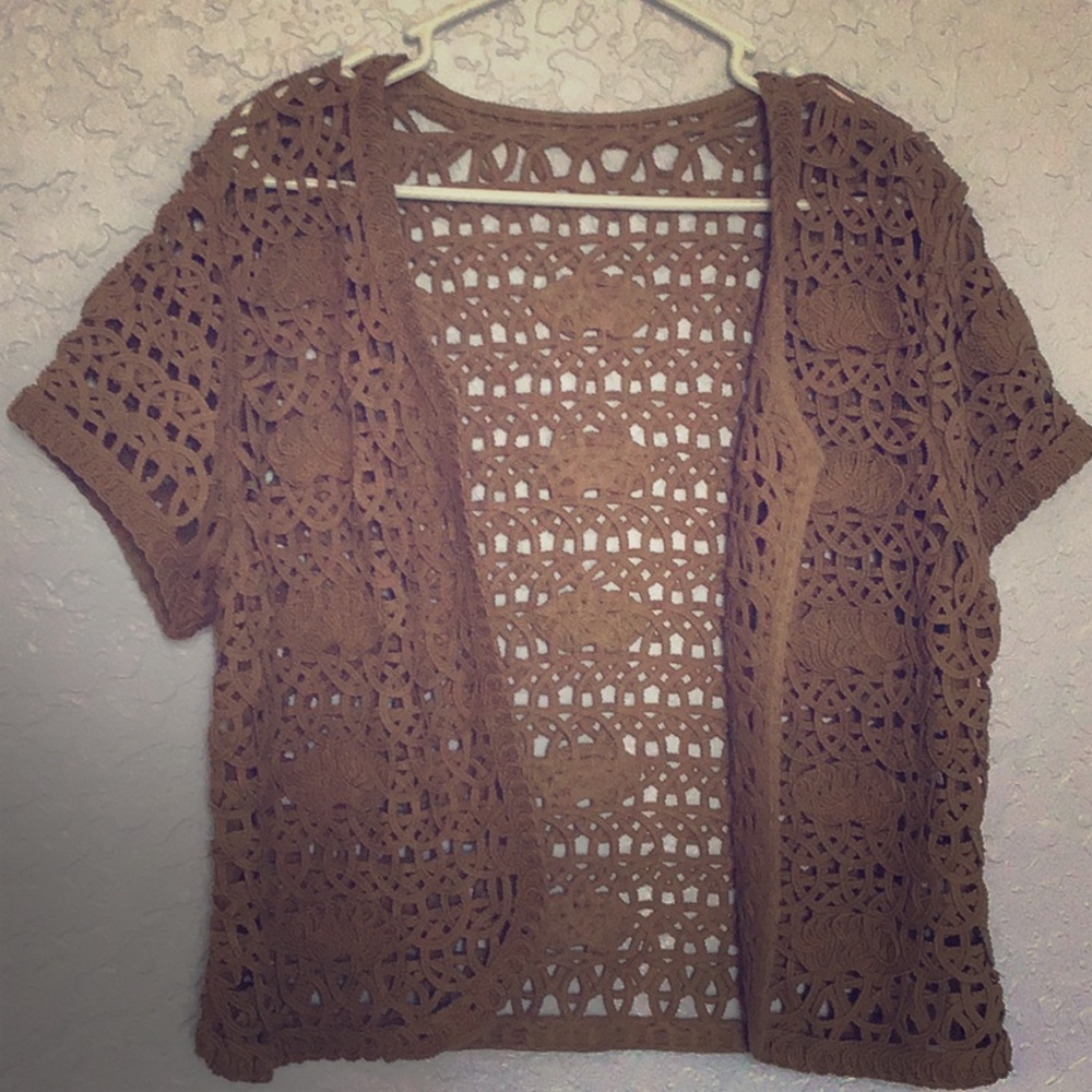 Elegant cardigan. New without tag.
